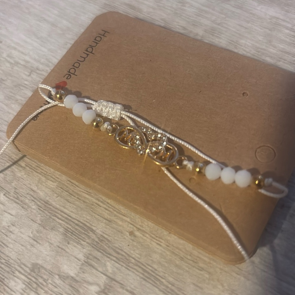 Gold and white bracelet